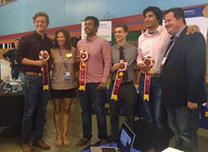 The second place team in the hackathon, Sense and Protect, (from left) Anthony Johnson, with Rina DiMare of the California State Fair, Dhrubajyoti Das, Peter Swanson and Alex Avalos with UC ANR Chief Information Officer Gabriel Youtsey.