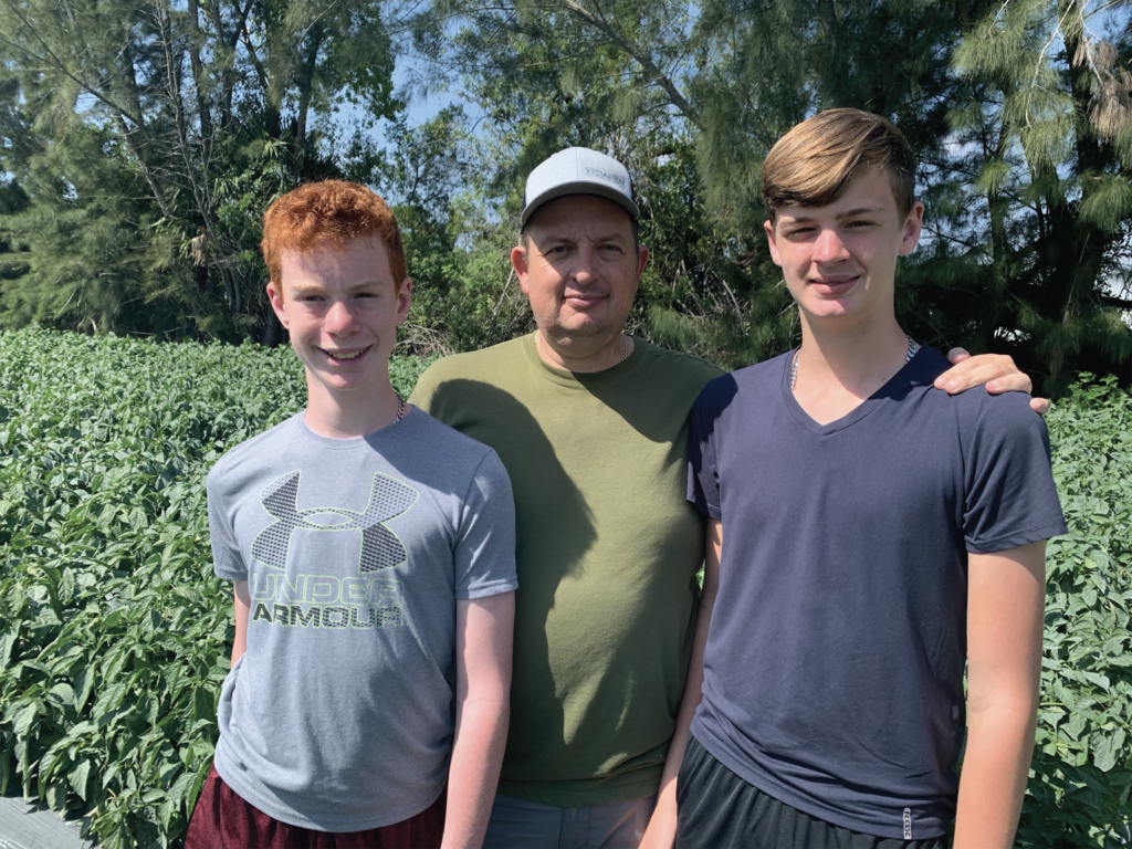 Fifth-generation Florida farmer, Clayton Amestoy with his sons, Micah, left, and Graysen, right. Amestoy will oversee a new 750-acre vegetable farm for J&J Family of Farms near Vero Beach, Florida. Photos: J&J Family of Farms.
