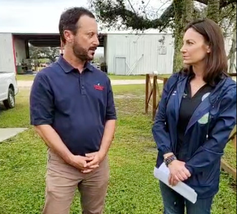 Jaime Weisinger, of Lipman Farms, talks about damage southwest Florida farmers experienced from Hurricane Ian with Florida Agriculture Commissioner Nikki Fried at a Lipman operation on Oct. 13.