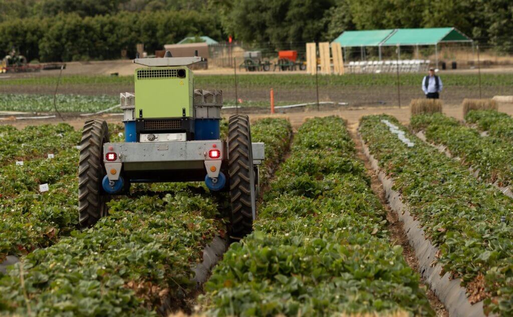 photo of machinery in strawberry field