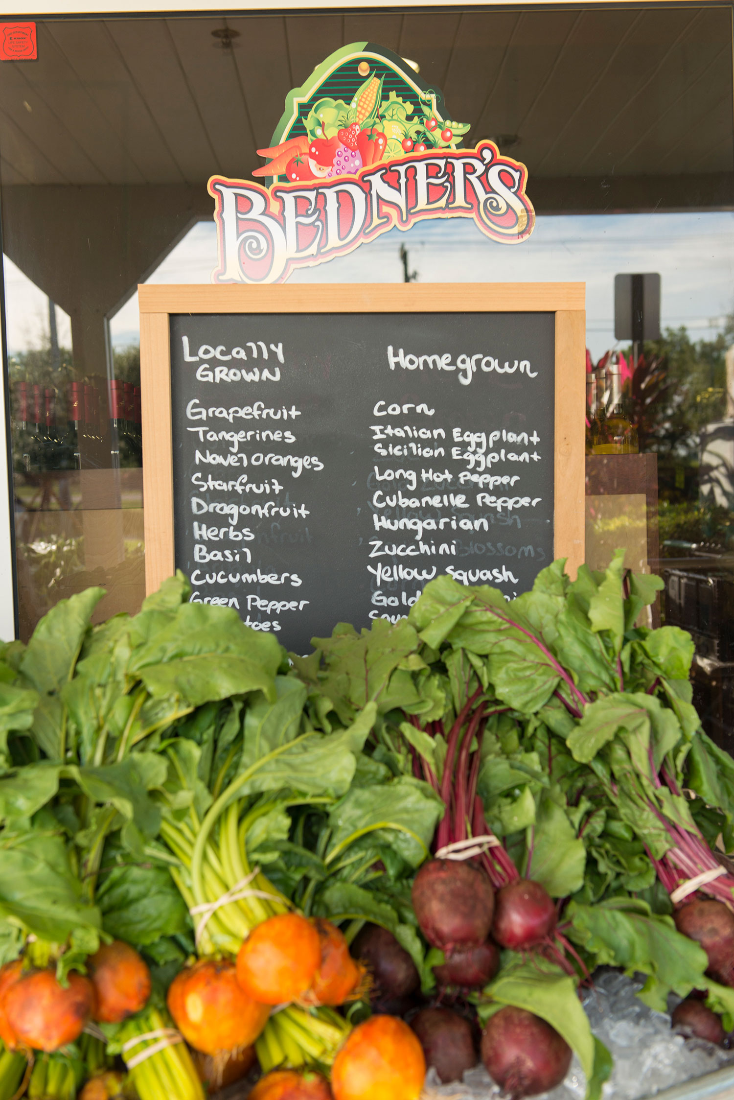 Sign at Bedner’s farm markets displaying how the farm promotes local and homegrown produce.