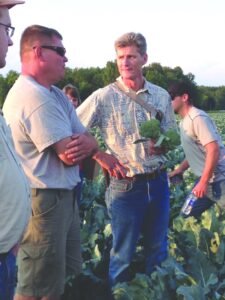 Mark Zittel, left, and Bjorkman inspect a trial of new broccoli hybrids during a field day in New York’s Eden Valley. Photo: Megan Burley