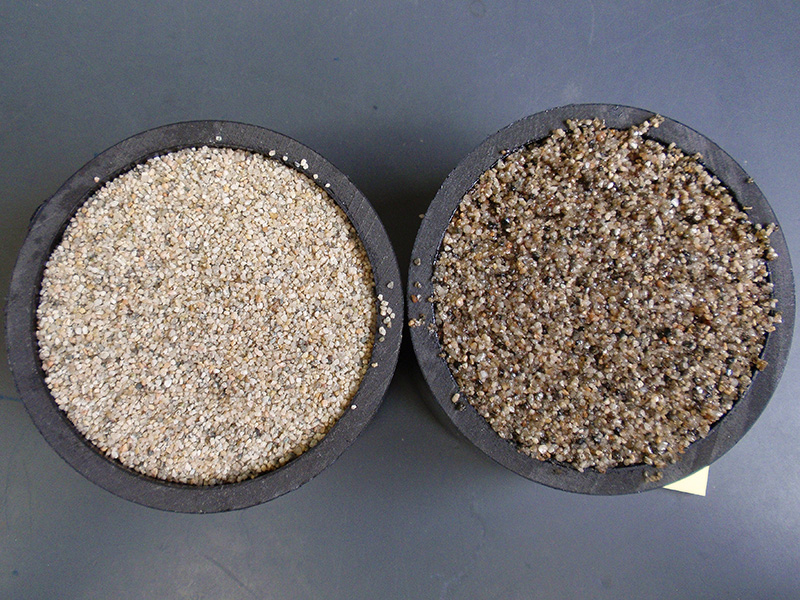 Sand particles coated in oil could help hold more moisture in the soil