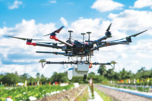 Drone flyer over a field