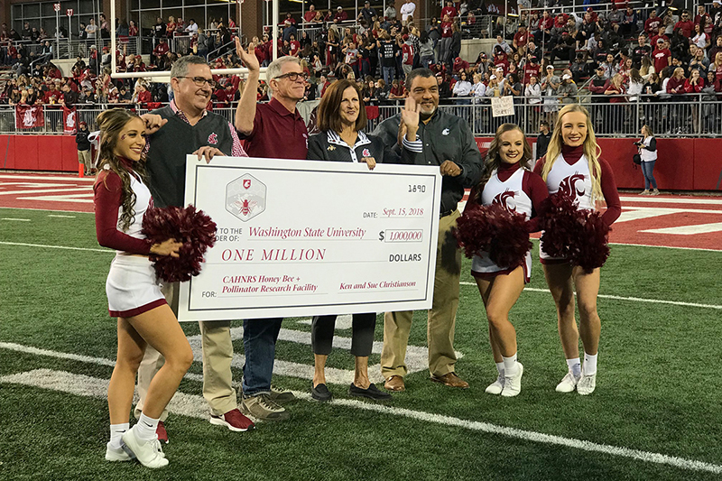 giant $1 million check presented in ceremony at WSU vs. EWU football game at Martin Stadium.